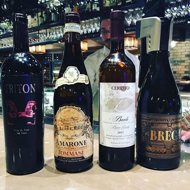 At @disney want a place for the parents to unwind??? Check out @winebargeorge for the best wines (by the ounce!!!). Perfect refuge for ailing parents. #heyjetsetbaby