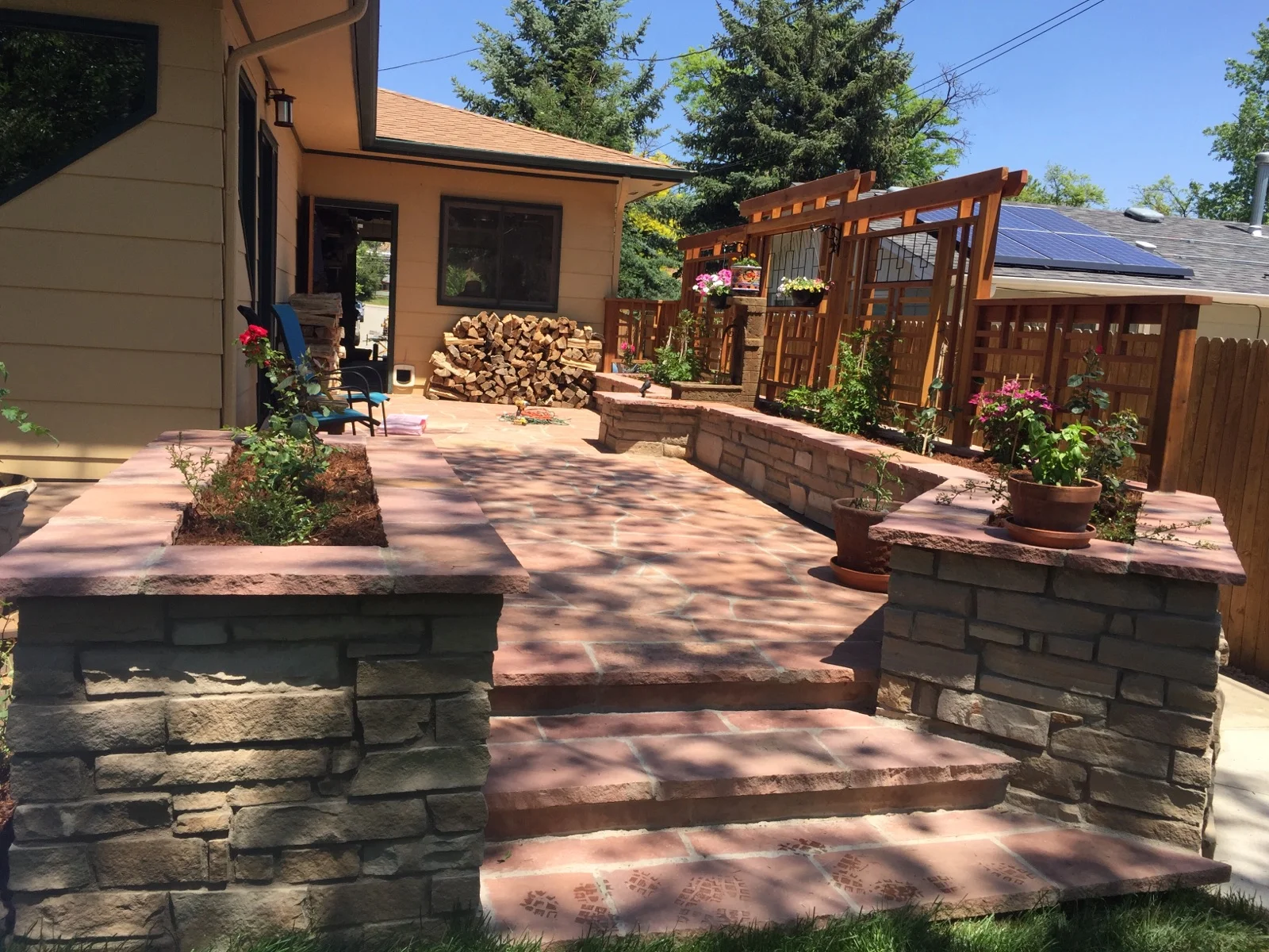 Custom water features, outdoor fireplaces, and outdoor fireplaces