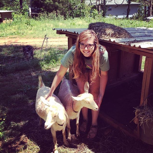 Lisbeth loves seeding in the greenhouse, transplanting, and spending quality time with the goats.