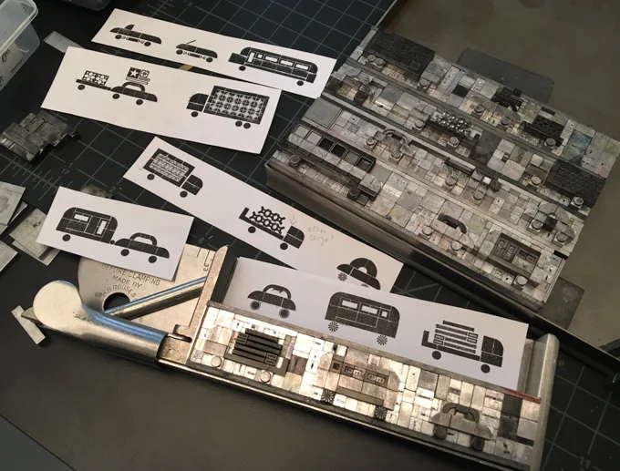 Typesetting cars and trucks with metal type