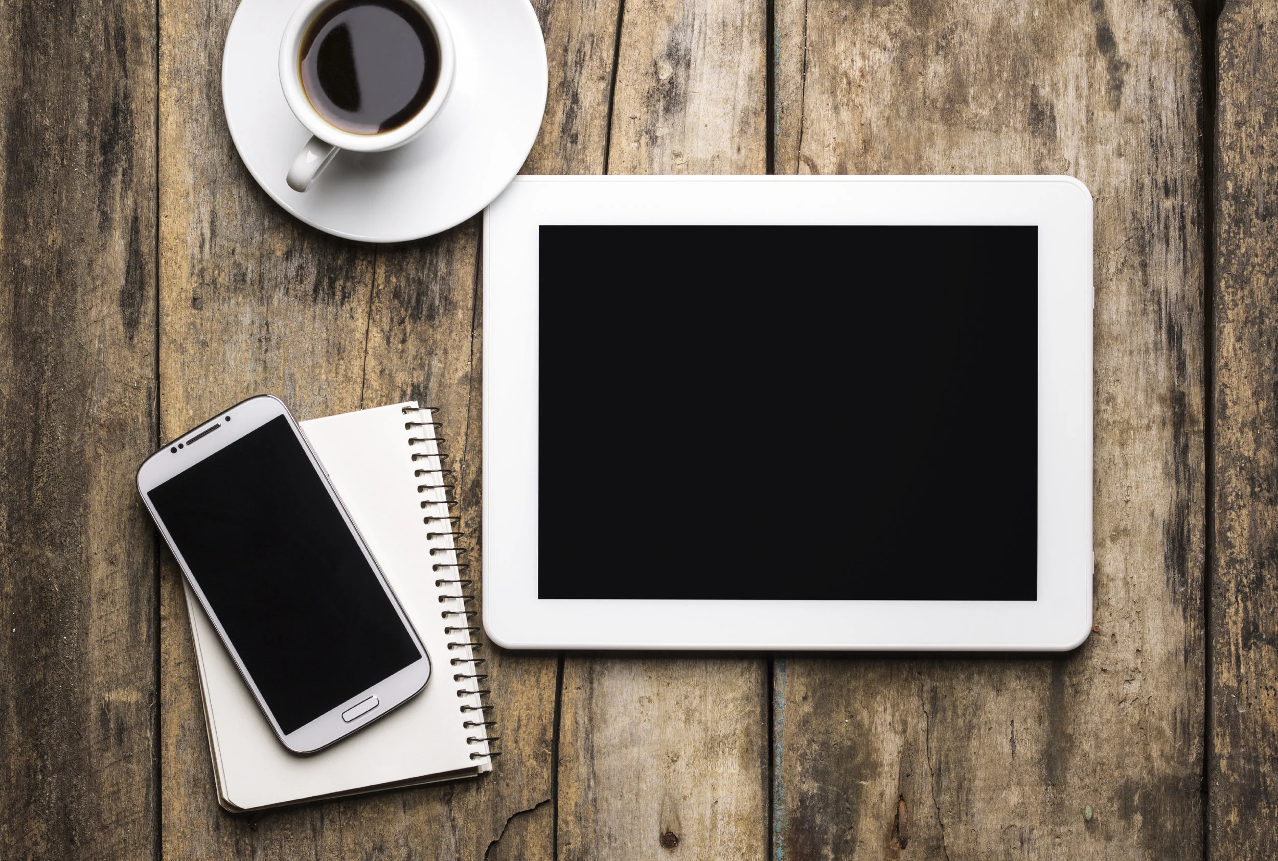 iStock_000055889484_Large - Coffee and iPad.jpg