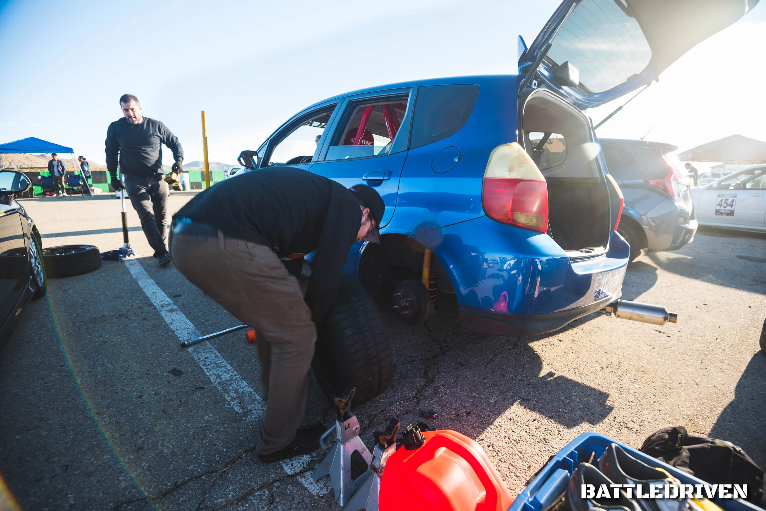 A Vtec Club regular, Tyler Colgett (@tpcolgett) swapping out his daily tires with his designated track wheel and tire combo before session one. He loves to keep things lively and never gets too serious or stressed out. Example, he had a transmission issue by the end of the day, could not drive home, and AAA would not cover roughly 80 miles. Tyler’s reaction, “it’s alright, it happens.” Thankfully, another Vtec Club regular, Rocco Bladeordie (@rollerboots666), strapped Tyler’s fit to his own fit and towed him home. Illegal, most definitely, but a good friend does not let another friend fork out $5-$15 per mile until AAA is within coverage distance.