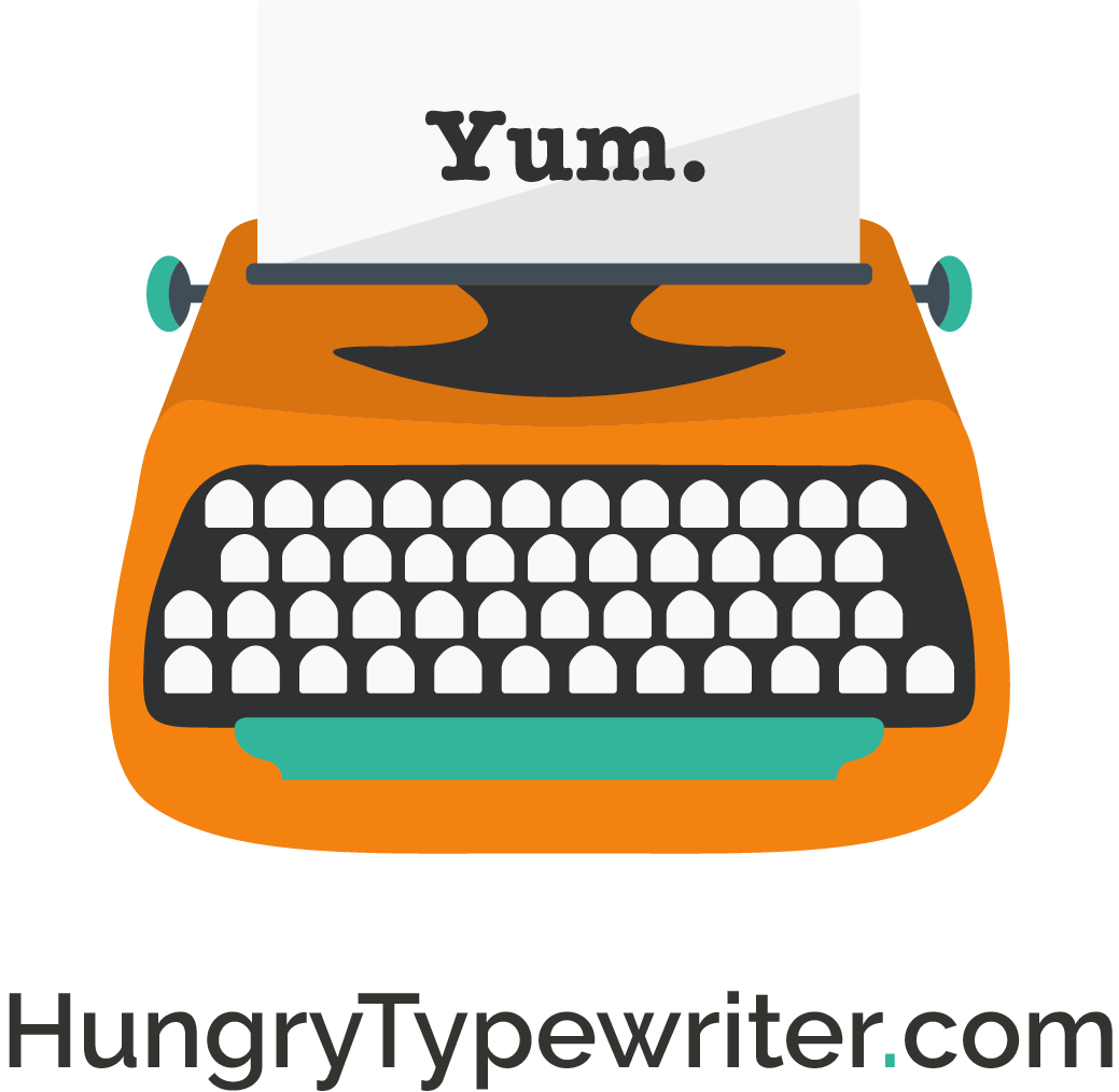 Illustration of an orange vintage typewriter with a sheet of paper displaying the word "Yum." Below the typewriter is the text "HungryTypewriter.com."