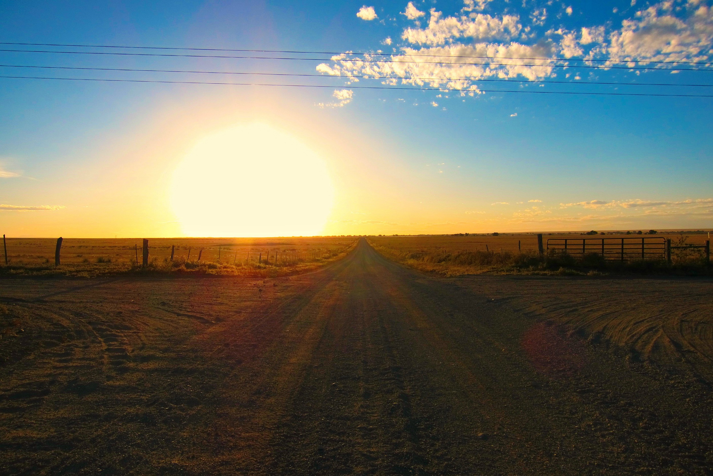 Sunset on gravel road resized.jpg