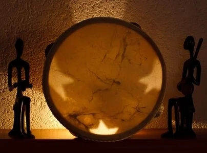 drum in transparency w 2 figurines.jpg