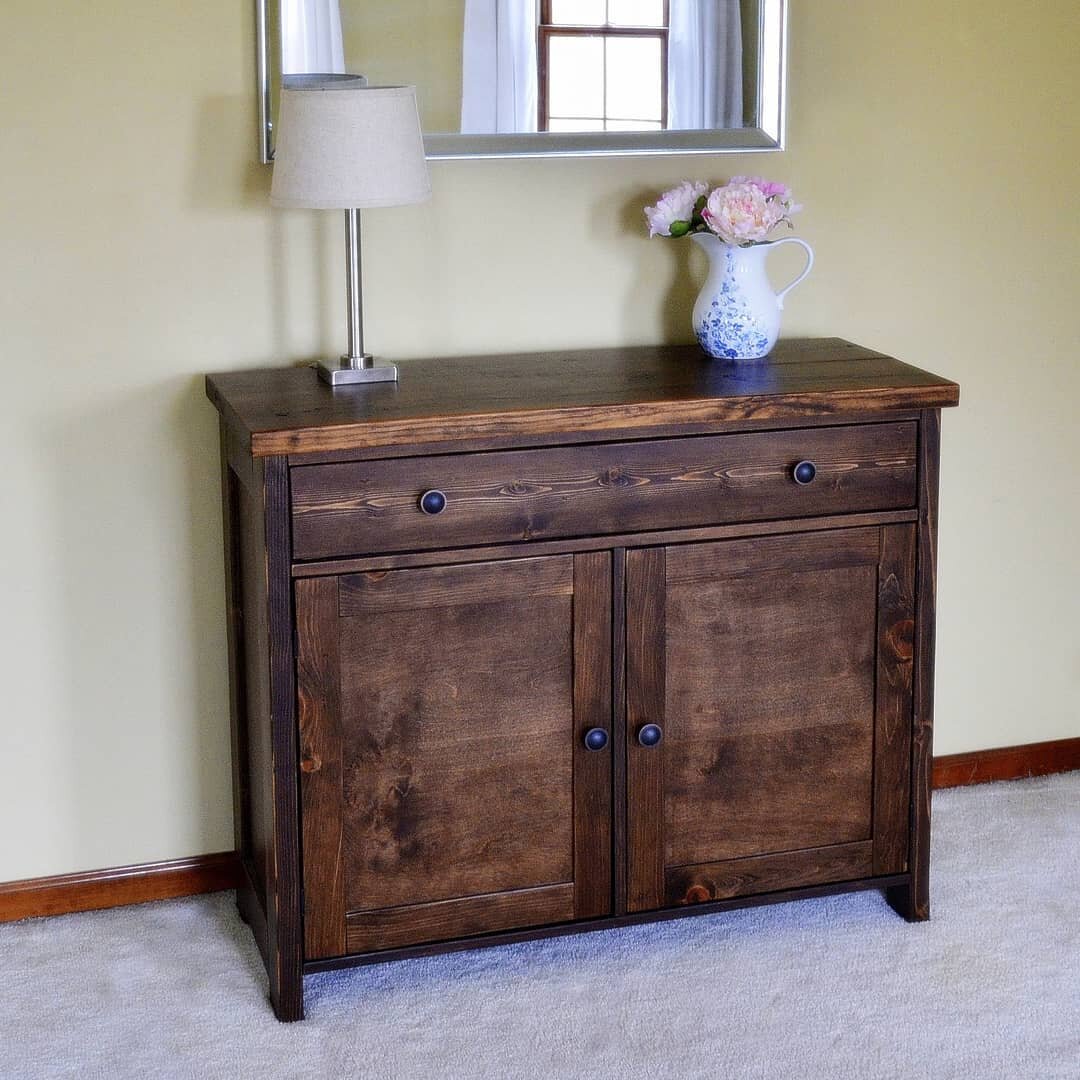 There is no place like 🏠 home.
.
We&rsquo;re all about mixing practical AND beautiful around here.  With its modern farmhouse appeal and clean, simple lines, our brand new modern farmhouse wood buffet offers plenty of storage and space to show off 