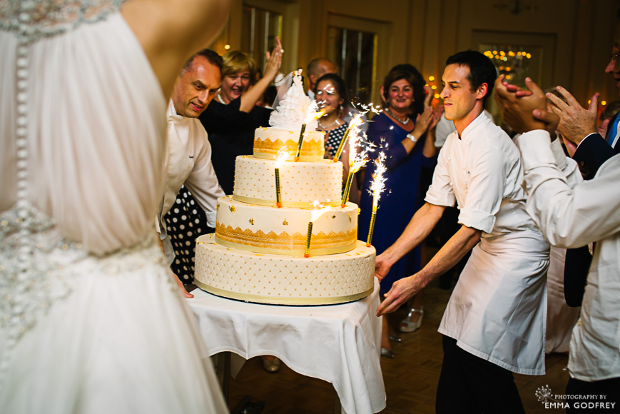 Wedding cake entrance with large sparklers