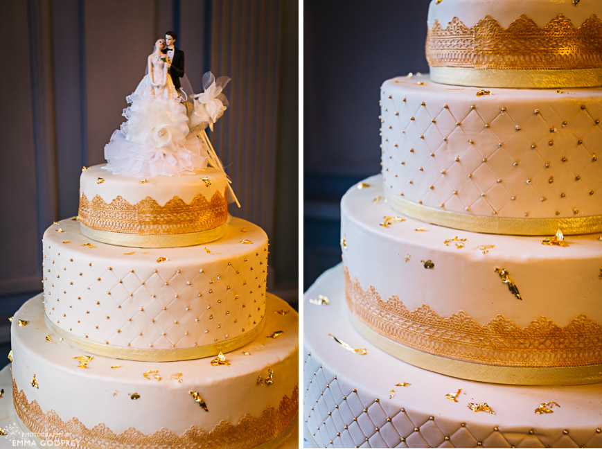 Four-tiered wedding cake in white and gold