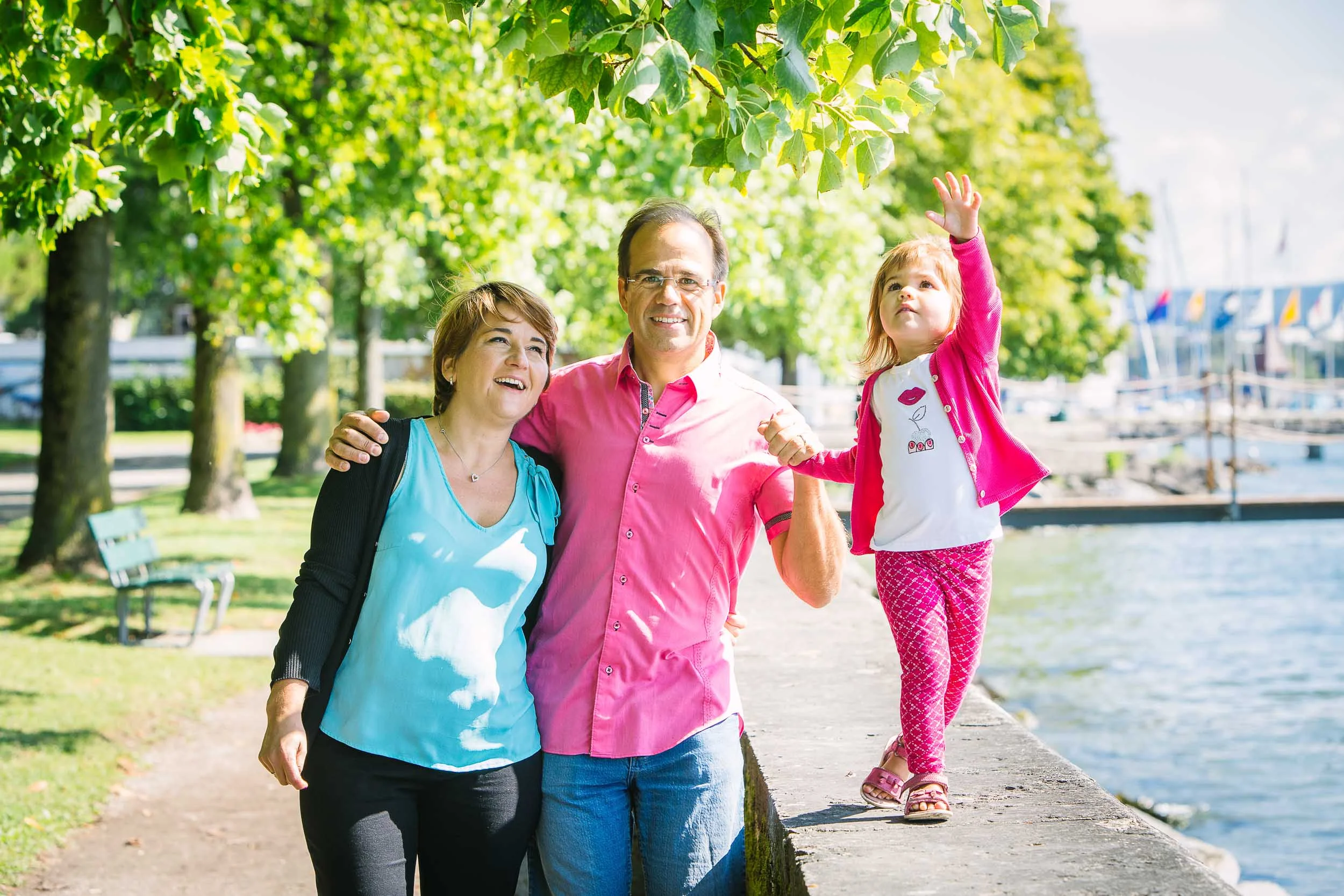 Outdoor summer family photo by the lake