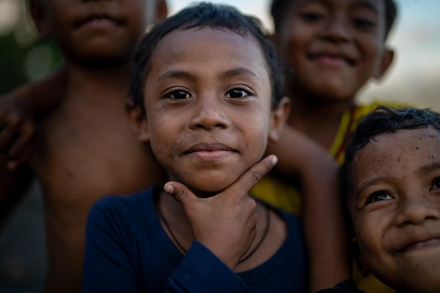 Kids pose on the beach in Ende, Flores Indonesia.