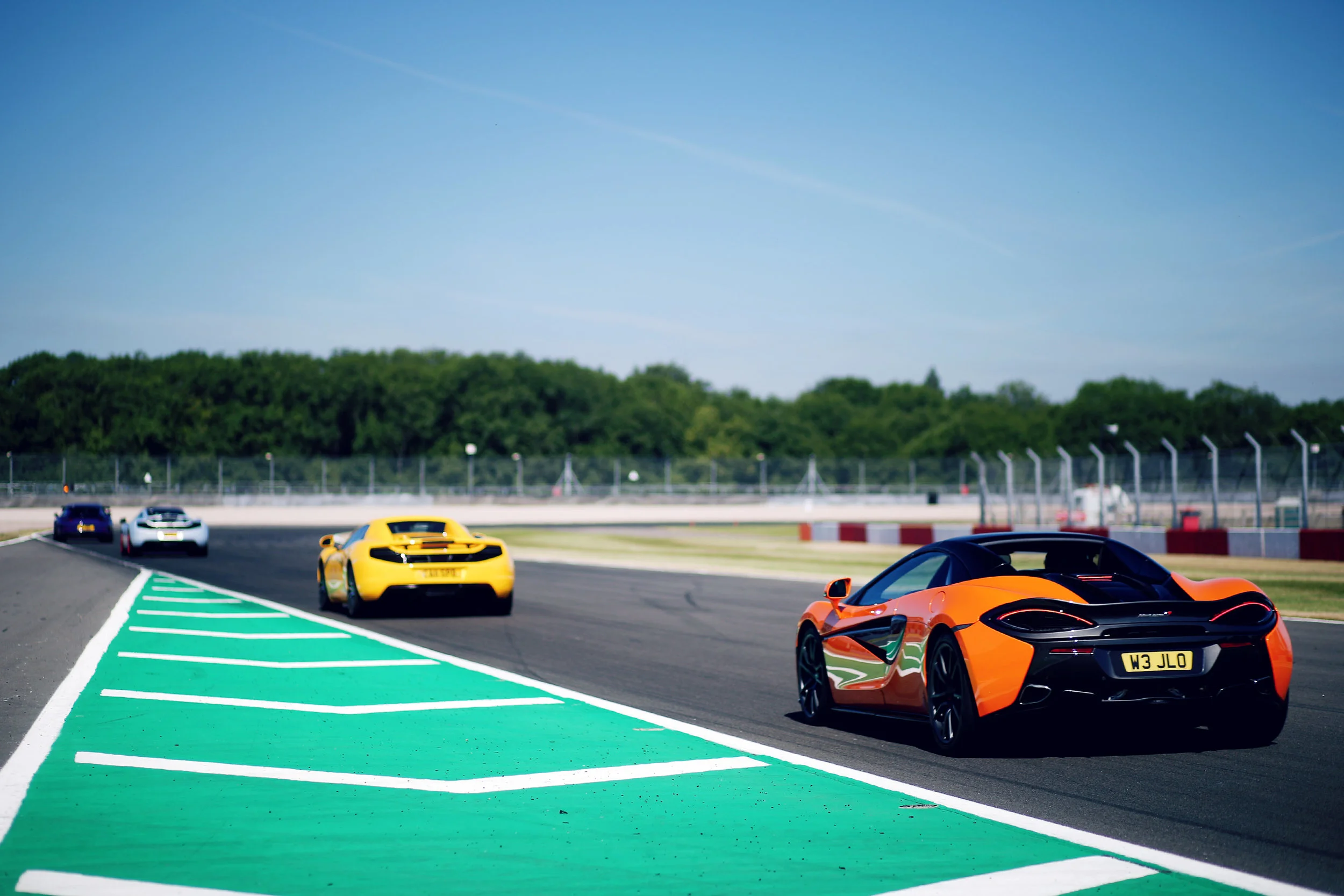 Four supercars taking on Redgate Corner at our 2018 Donington Park Greystone GT trackday
