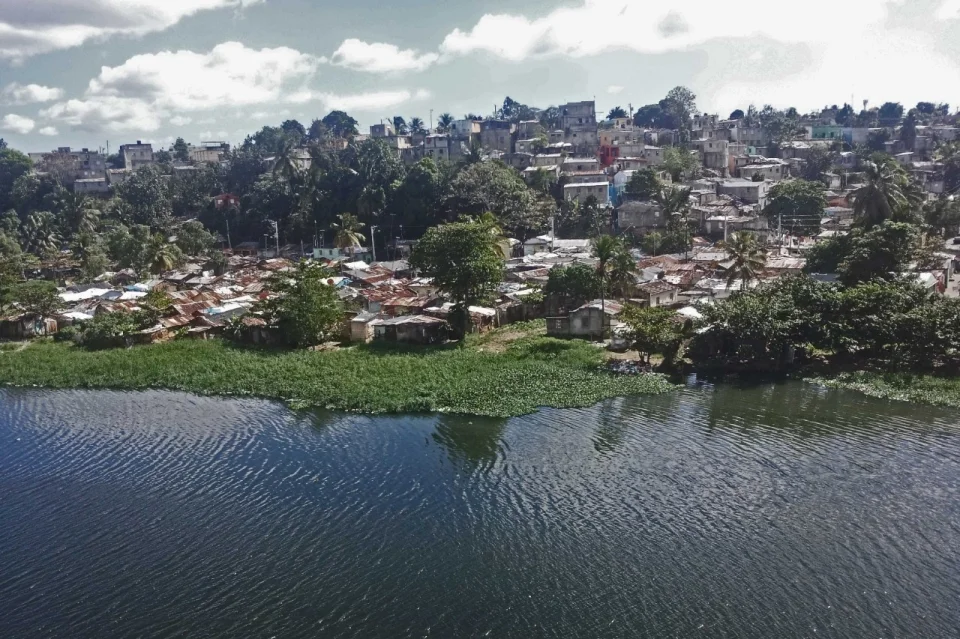 The neighborhood of La Barquita floods three or four times a year, and flooding is expected to increase because of climate change. (image from article by Renee Lewis)