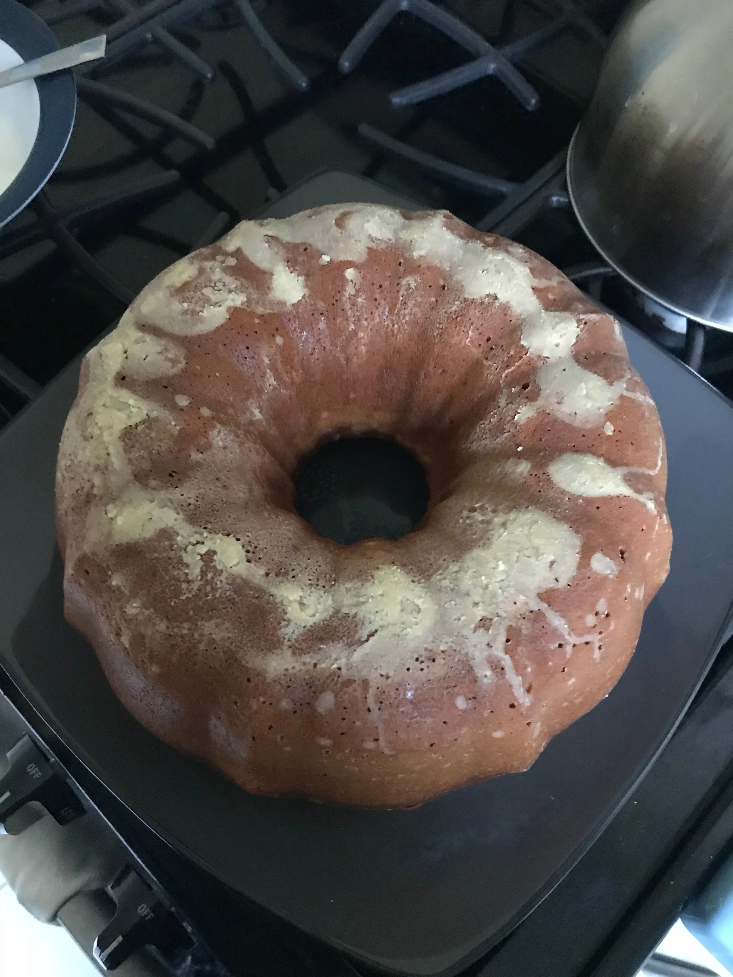 When you get done, the cake should come out looking like this. You can make the icing any way you'd like but I like the lemon juice and sugar approach. Mix lots of powdered sugar with lemon juice and keep mixing it up until you're ready to use. DO NOT refrigerate the icing. Your final cake will end up looking like this and tasting like a piece of Heaven. You're welcome. 