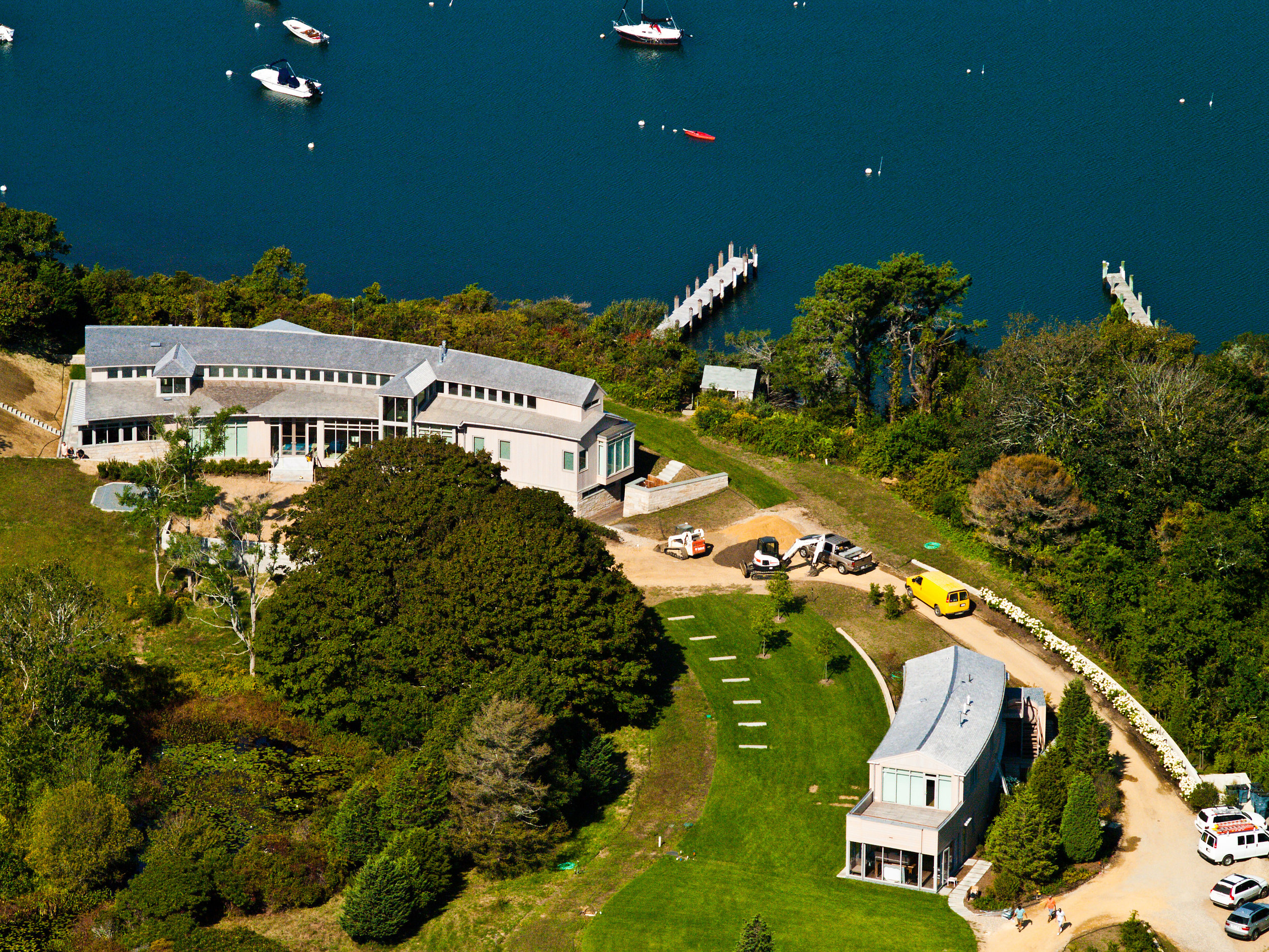 A Martha's Vineyard mansion with accessory building under construction