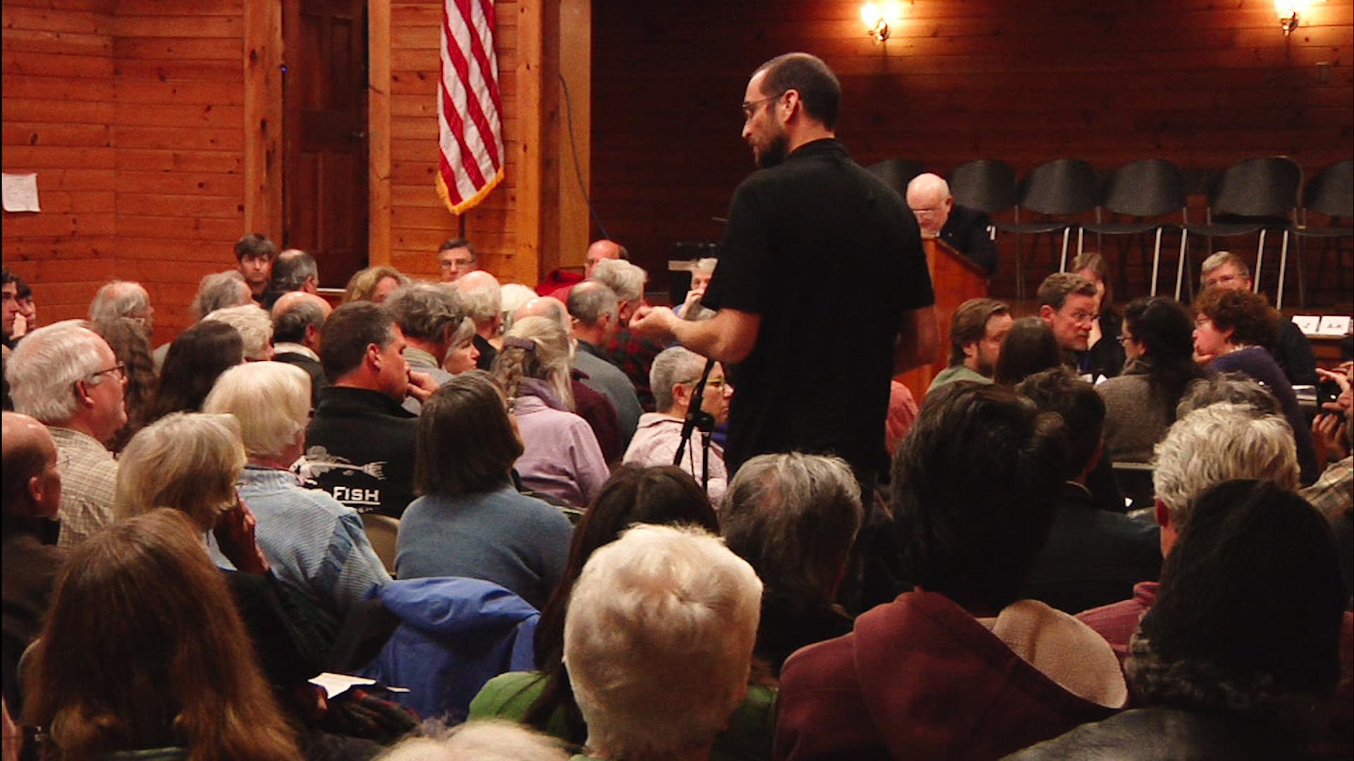 Filmmaker Thomas Bena speaks at Chilmark's town meeting in support of a bylaw limiting house size