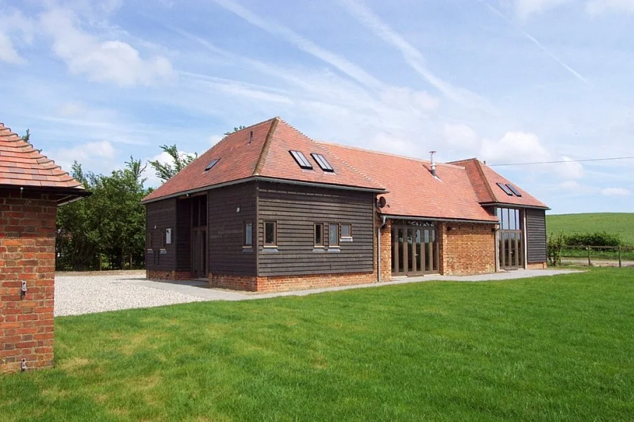  The rear elevation looks out across Kent's countryside.     Client - Robert Hunter  Managing contractor - Avocete Estates  Project director - John Sturdy Lee Evans Partnership  Project architect - Adam O'Neill Lee Evans Partnership    