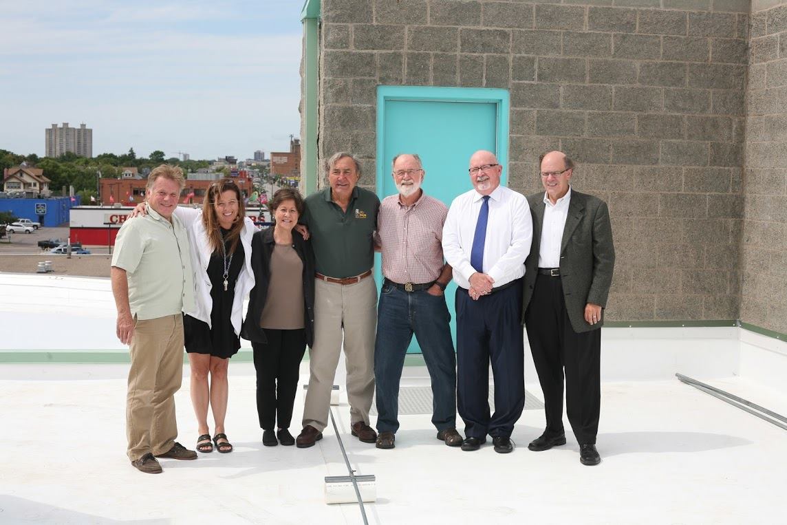 Division of Indian Work's Executive Director, Louise Matson (second to the left), poses with our Board of Directors on our brand new roof! 
