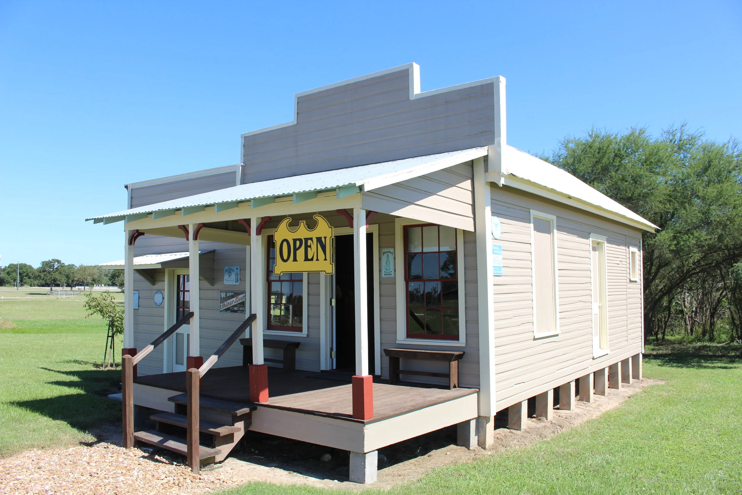 The main building was donated by Roy Buček of Schulenburg and a side room for a general store was added on by volunteers. A tavern/store was the center of early Texas-Czech communities where immigrants would meet, get mail and information of the outside world, have a pivo (beer), and purchase necessary staple goods.