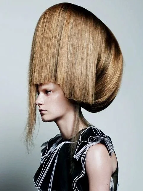 Voluminous blonde beehive updo hairstyle Vogue Italia | Nicolas Jurnjack