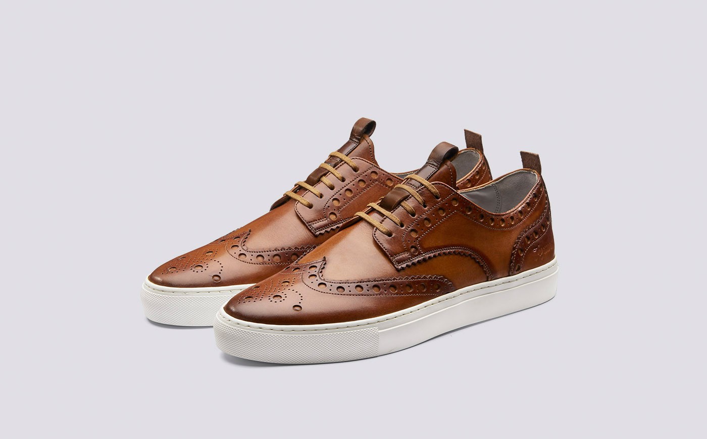 111453_-_sneaker_3_-_tan_hand_painted_calf_leather_-_brogue_sneaker_-_white_rubber_sole_-_3_quarter.jpg