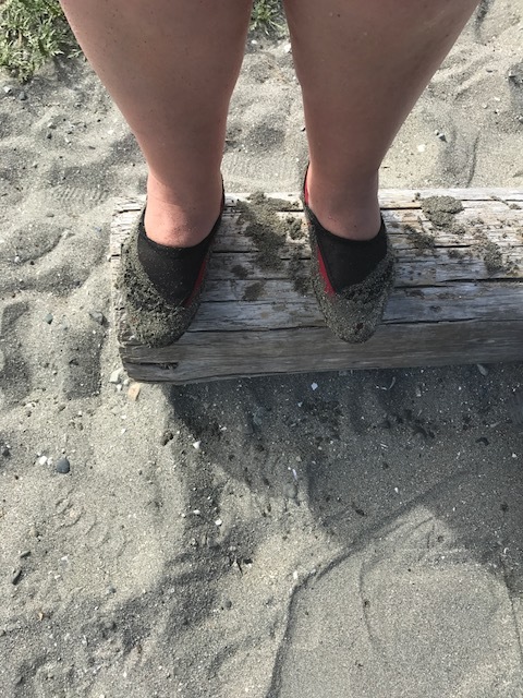 Red and black shoes quickly became so sandy that you couldn't tell what colour they were. 