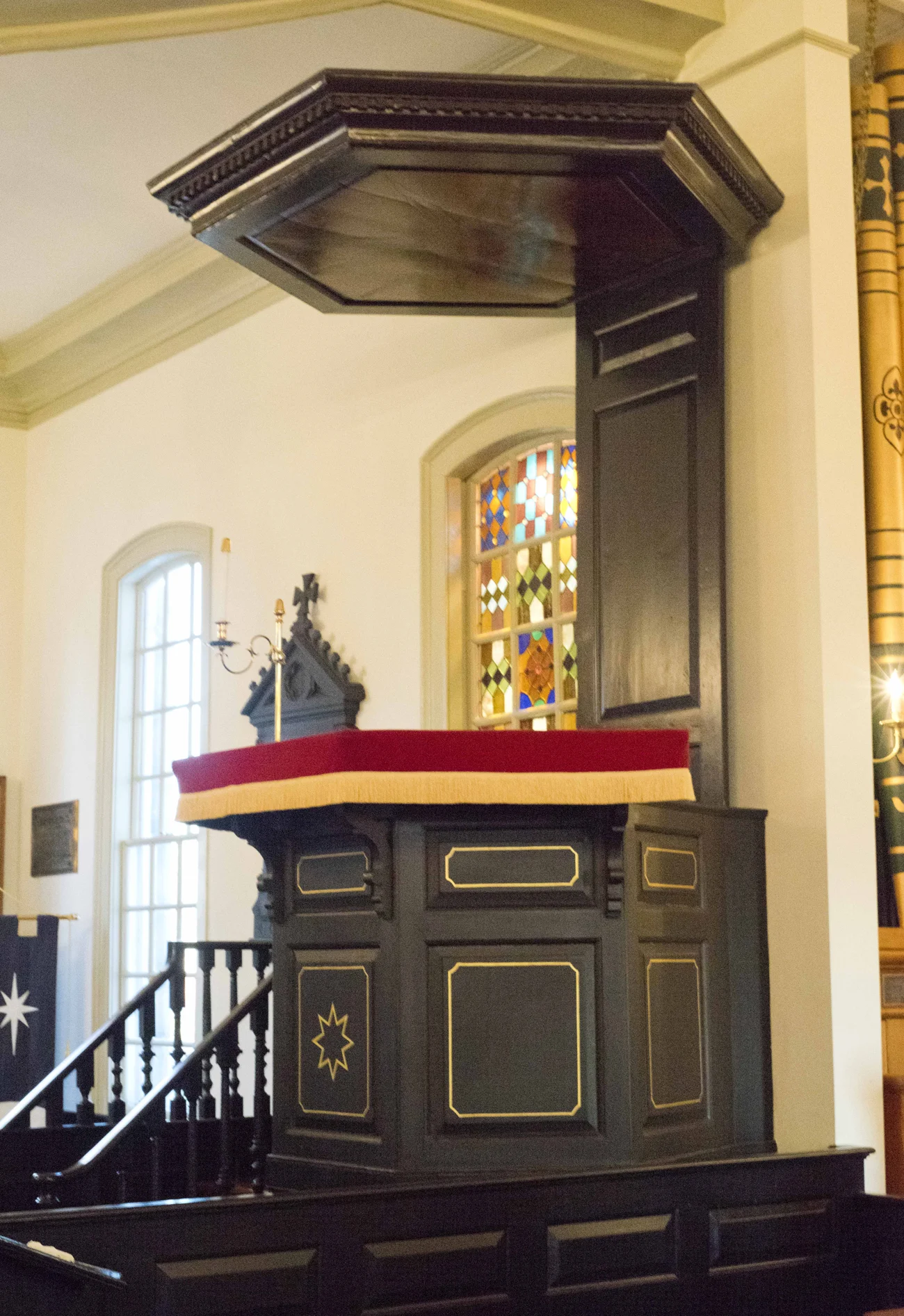 The sounding board which dates to 1741 is located above the pulpit inside St. John’s.