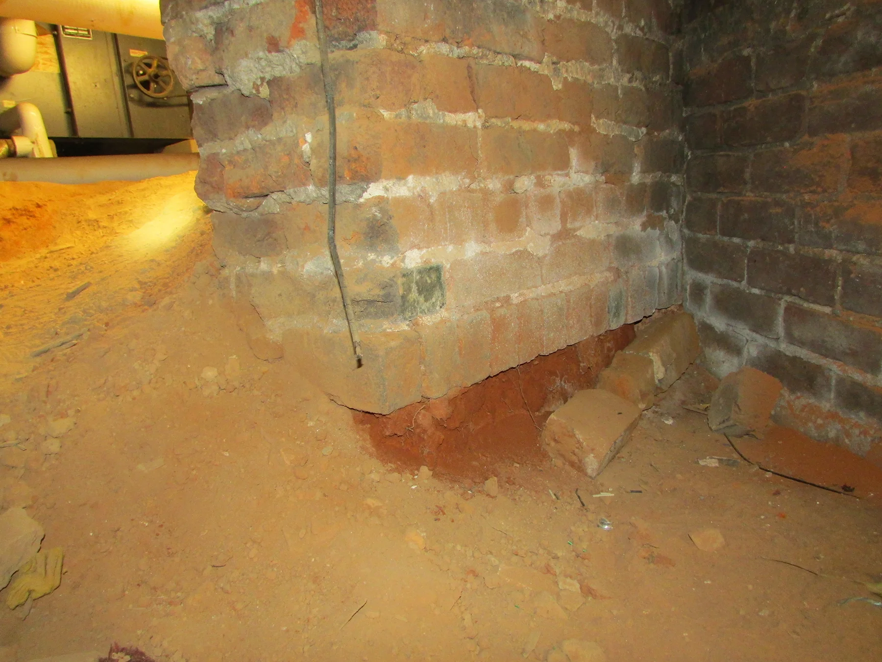 This brick pier undermines the solidity of the foundation.