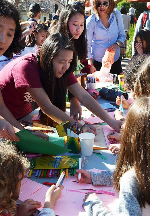 Volunteers from OneSky helped us make paper lanterns.