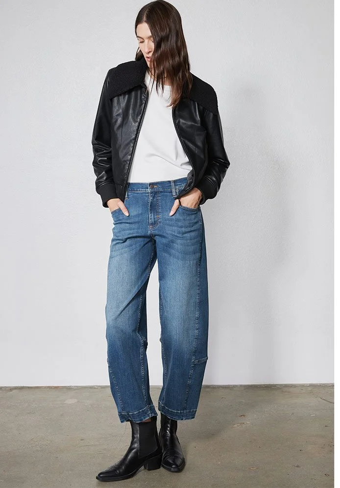 Fall denim at Ruti. Deep blue denim and a relaxed take on the classic Western shirt set the tone for the season.

Wear the shirt with jeans for a coordinated look, or layer it over your everyday favorites. Explore the Fall Denim Collection at Ruti on