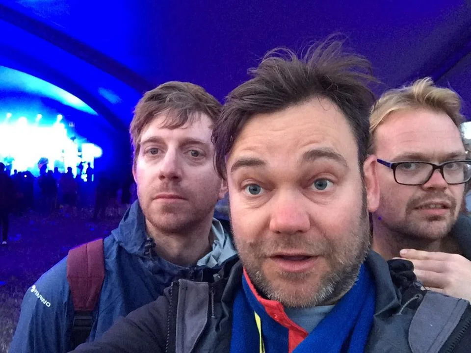 Chris, Jes and Paul at Glastonbury. Looks photoshopped but surprisingly isn't!