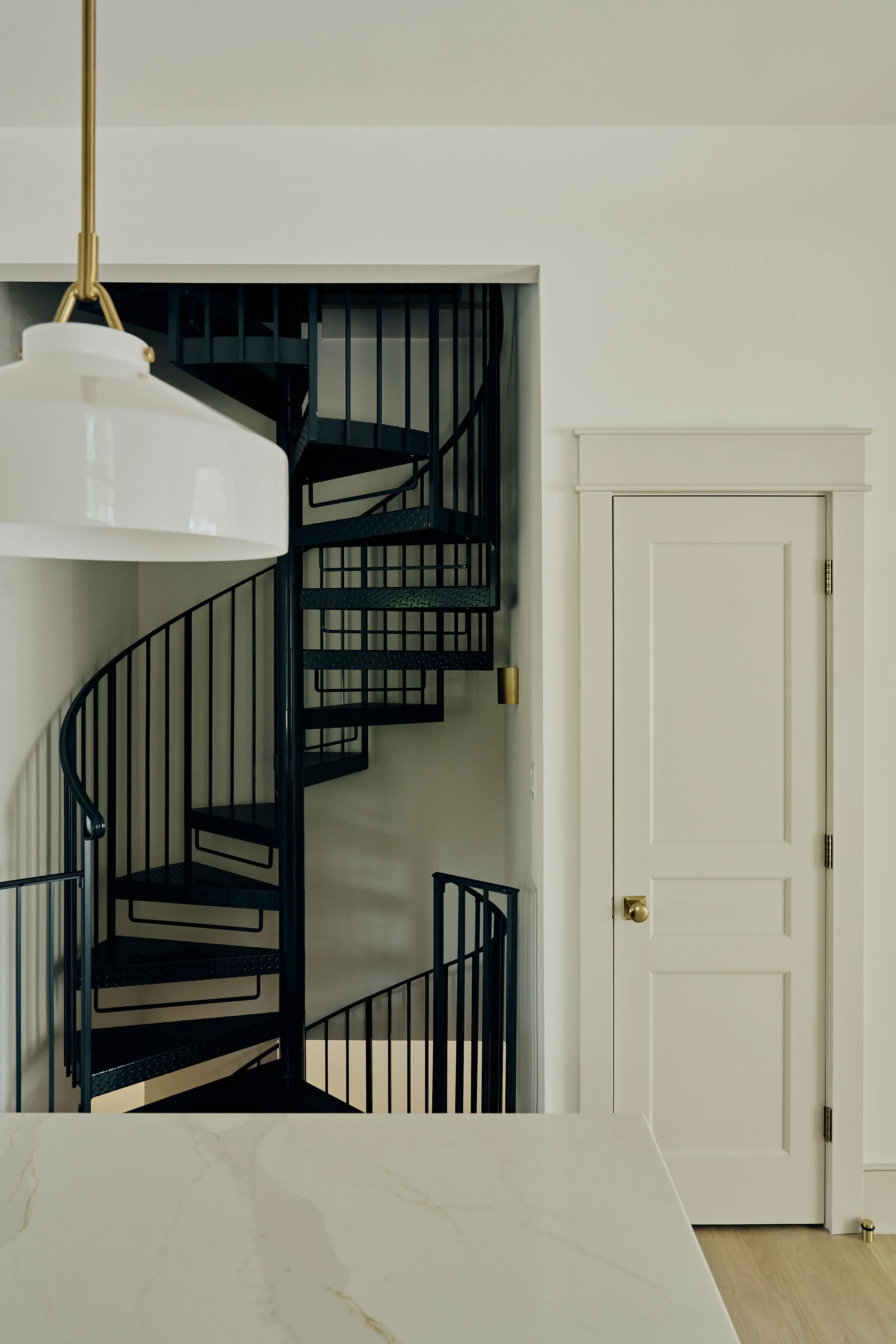 sprial stairs kitchen view.jpg
