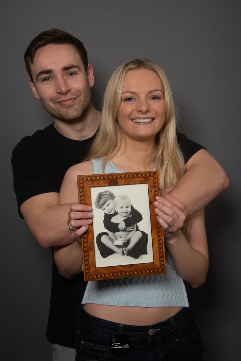  The photograph this couple are holding is of this young lady with her brother when she was a year old. Her brother wasn’t available for the photoshoot so her lovely boyfriend stepped in! 