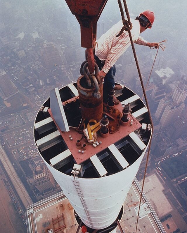 These dizzying photos were taken by New York Photographer, Peter B. Kaplan in 1979 with the construction workers who installed the 360-foot antenna on the World Trade Center's Tower  Tower 1, the north tower, was completed first in 1971and was six fe