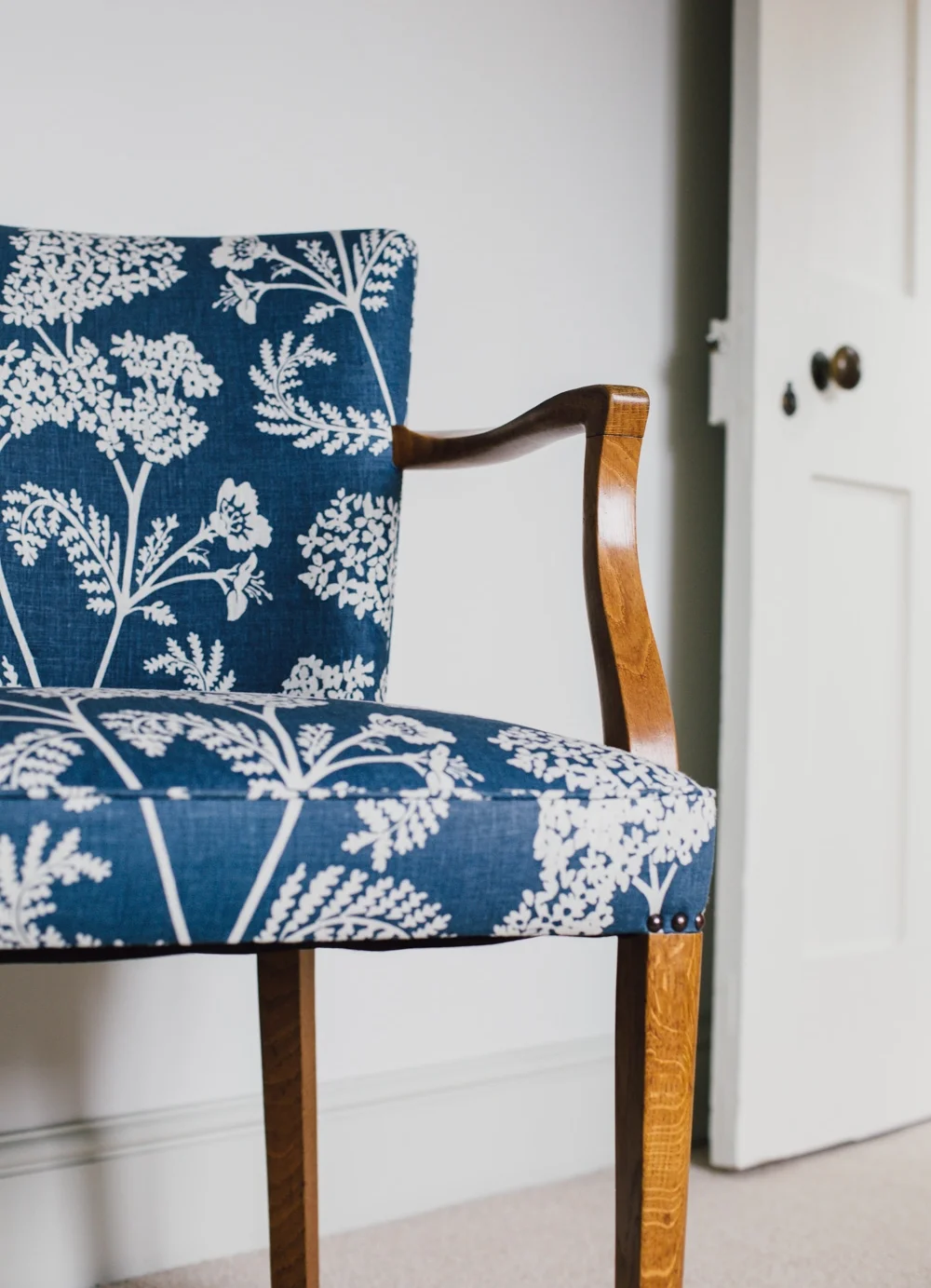 Achillea ground large in Burghley blue on natural linen.
