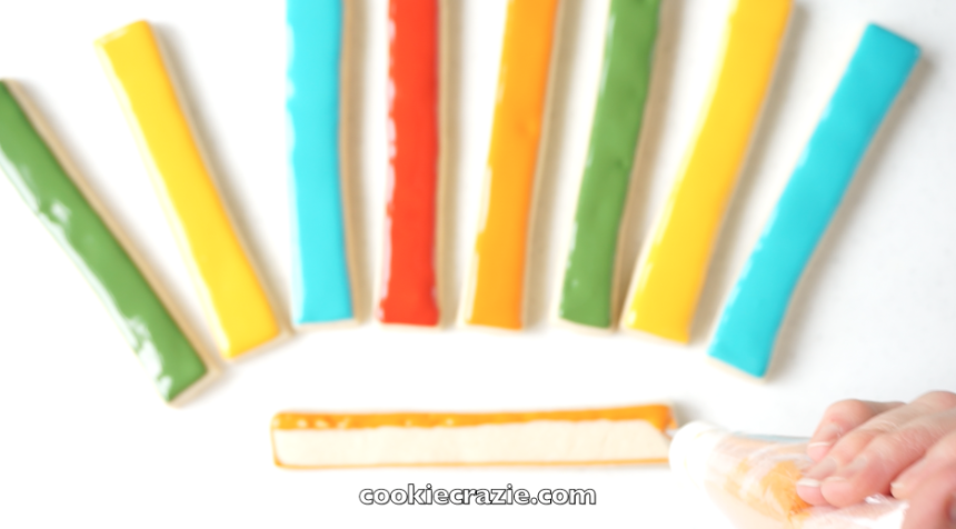 Outline and flood the rectangular sticks in various colors to represent the turkey's feathers. 