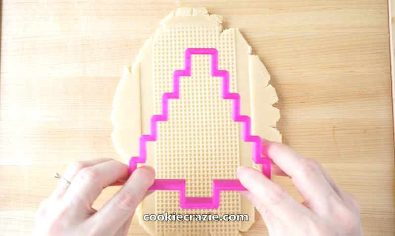  Before baking the cookie dough, place an impression mat face down on the dough and impress the dough by adding pressure from a rolling pin. Cut out the shape using the embossed dough. The two mats used for these designs: 1)  Burlap &nbsp;and 2)  Woo