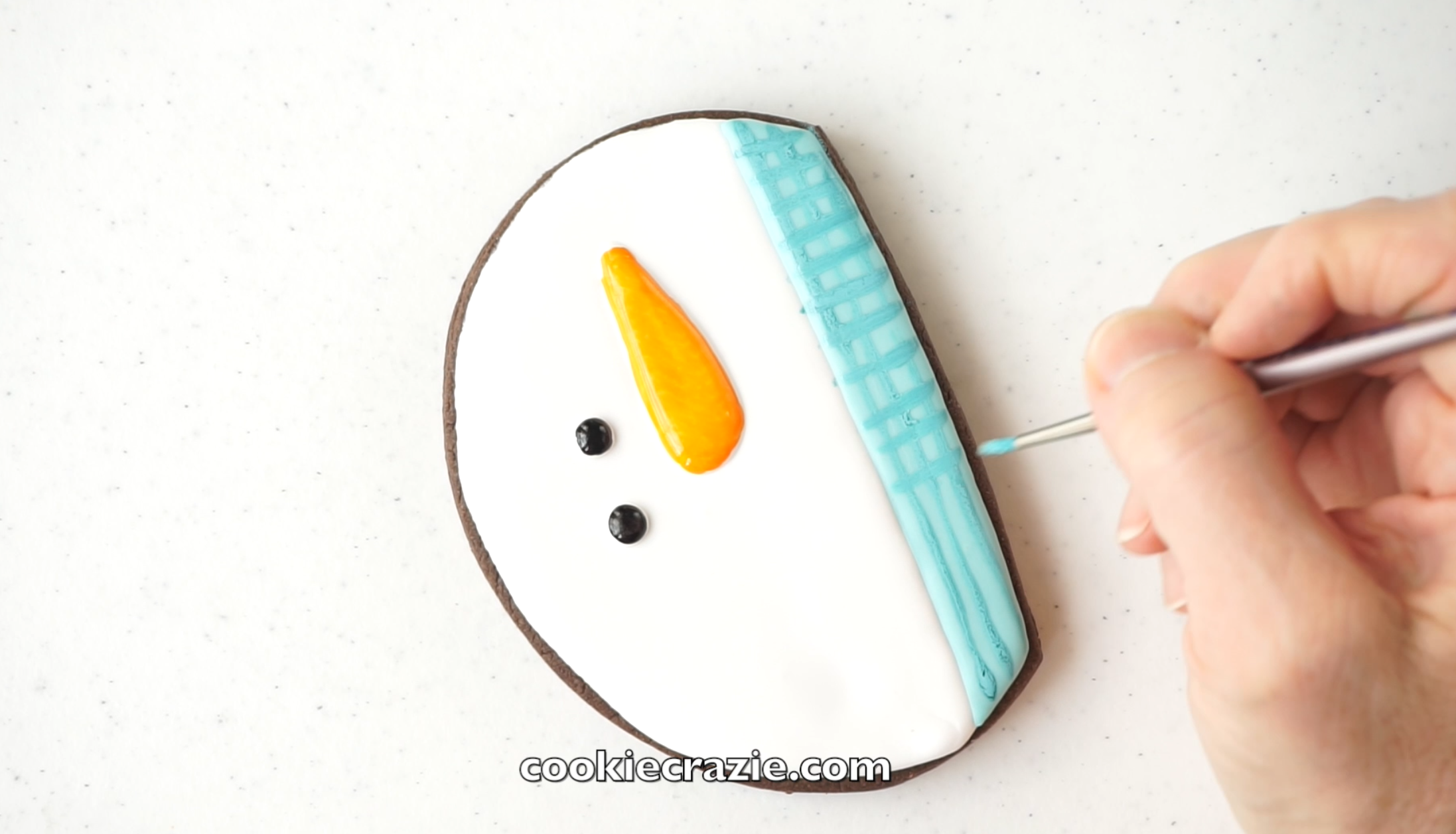 Using a color that is subtly different than the scarf glaze color, paint stripes over the dried scarf. (You can use straight gel or luster dust mixed with vodka).