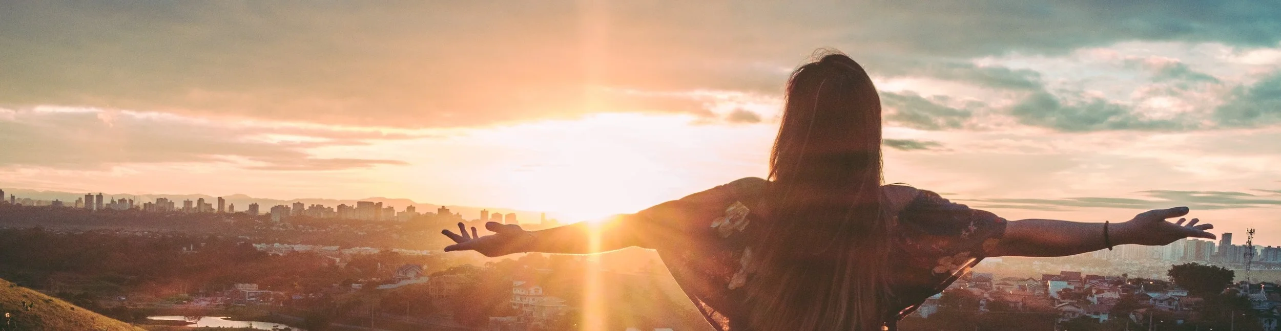 back-view-backlit-city-847483.jpg