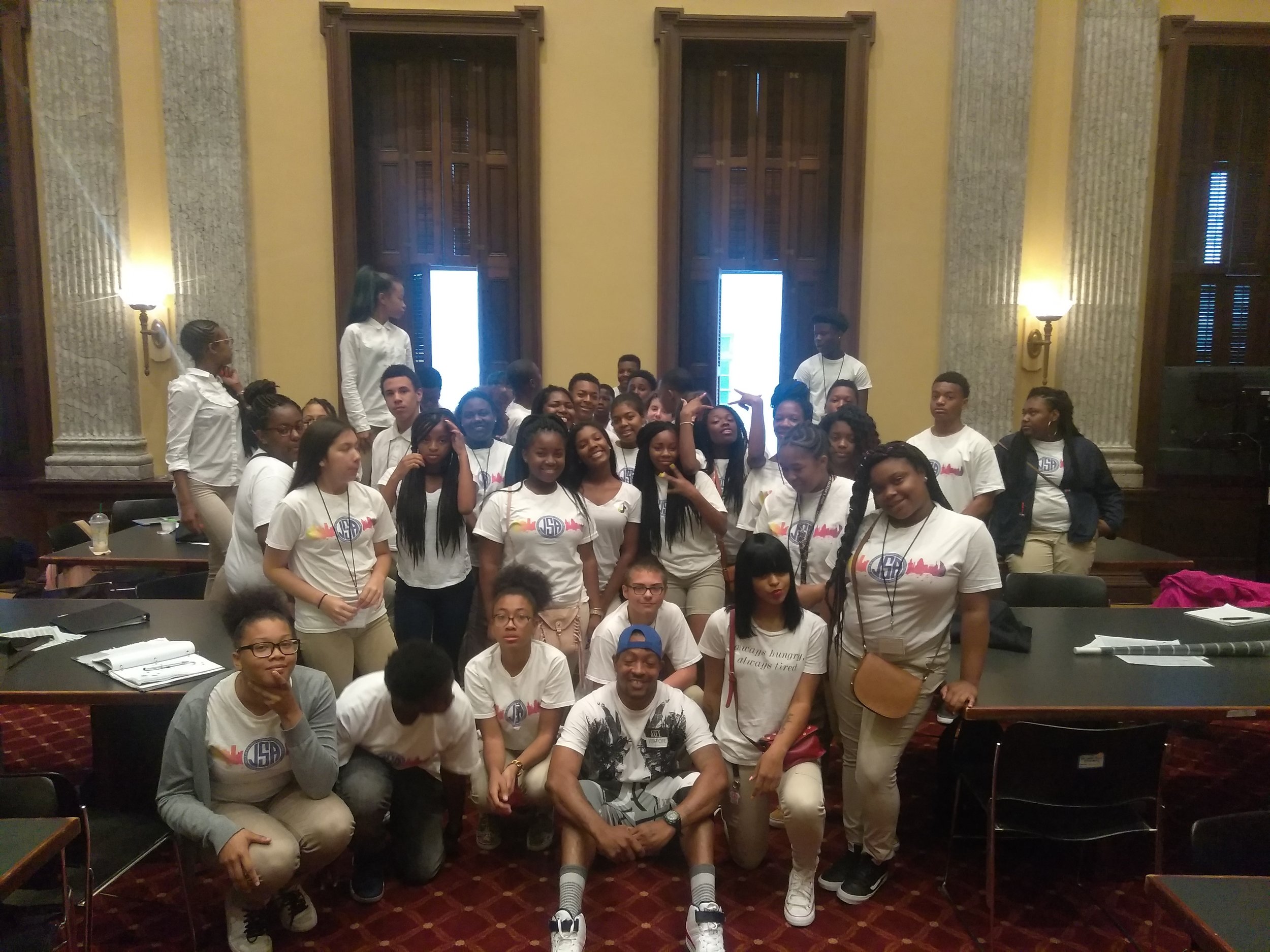  HOPE leader Antoin Quarles with youth from City Hall Urban Community Development to Relieve Barriers 