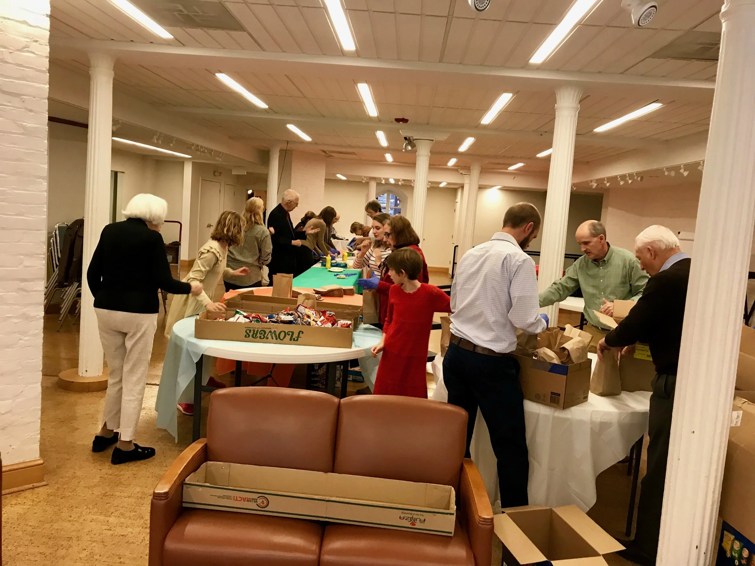 Preparing lunches for Happy Helpers for the Homeless