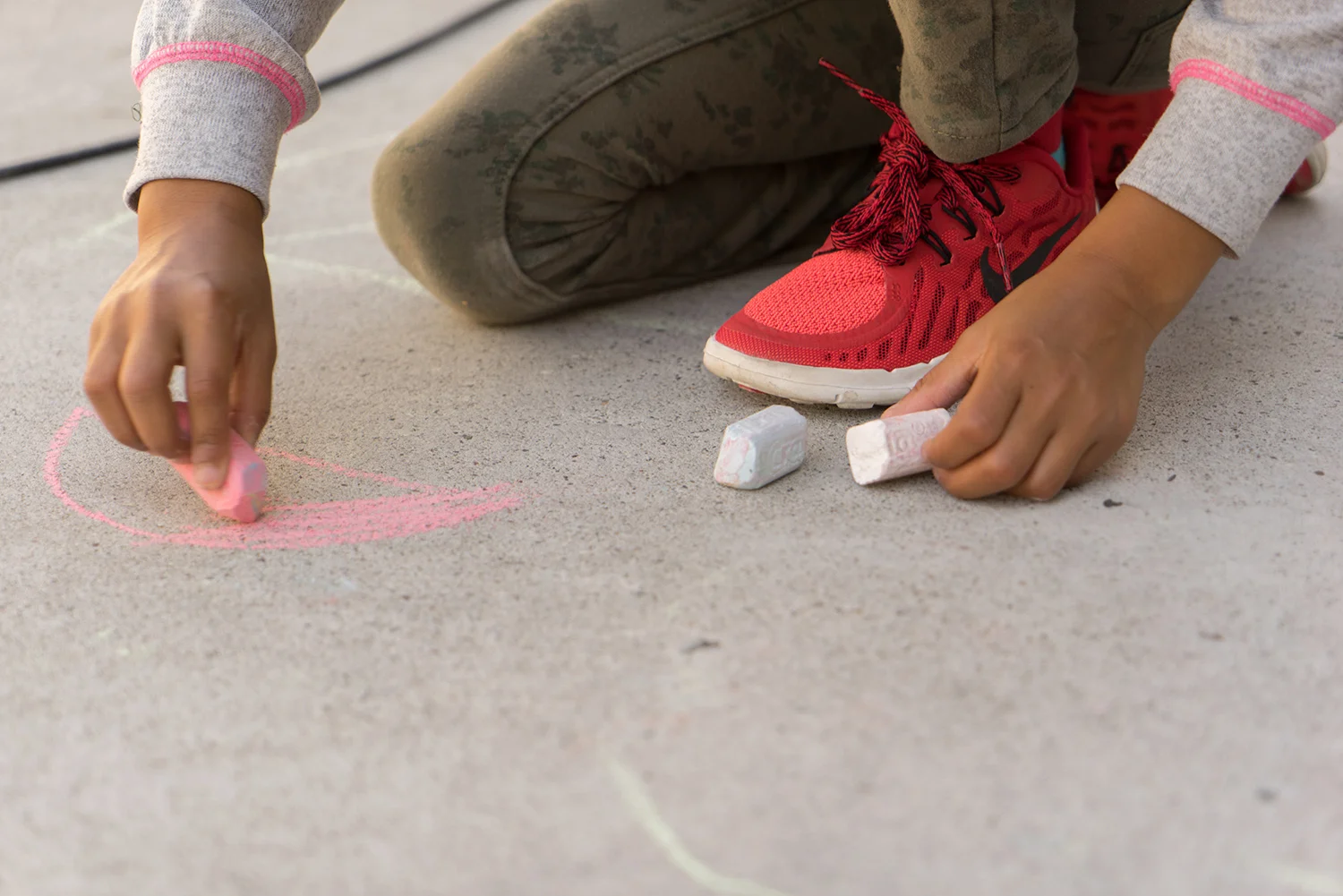 6 year old girl draws with chalk-SF East Bay children's photographer