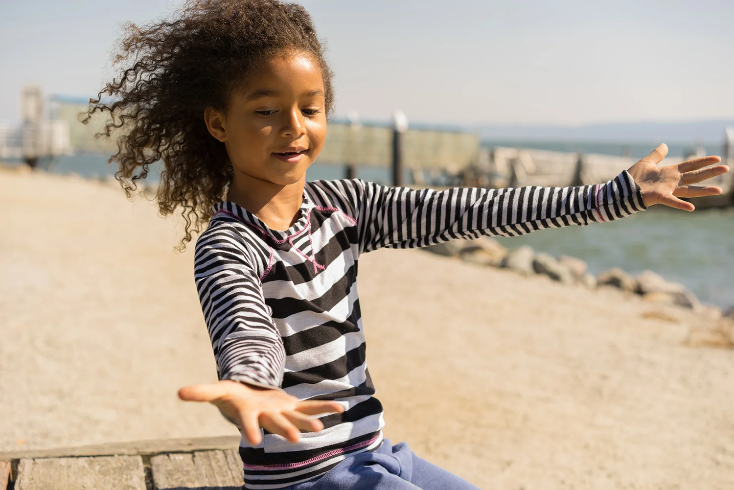 daughter having fun at Alameda Beach-San Francisco East Bay photographer
