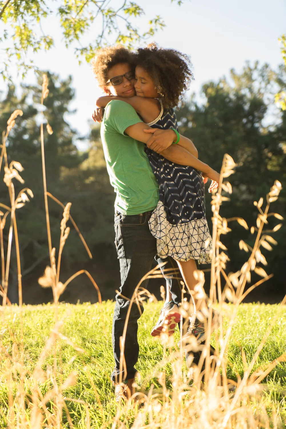 sister and brother hugging at the park-SF Bay area lifestyle photography