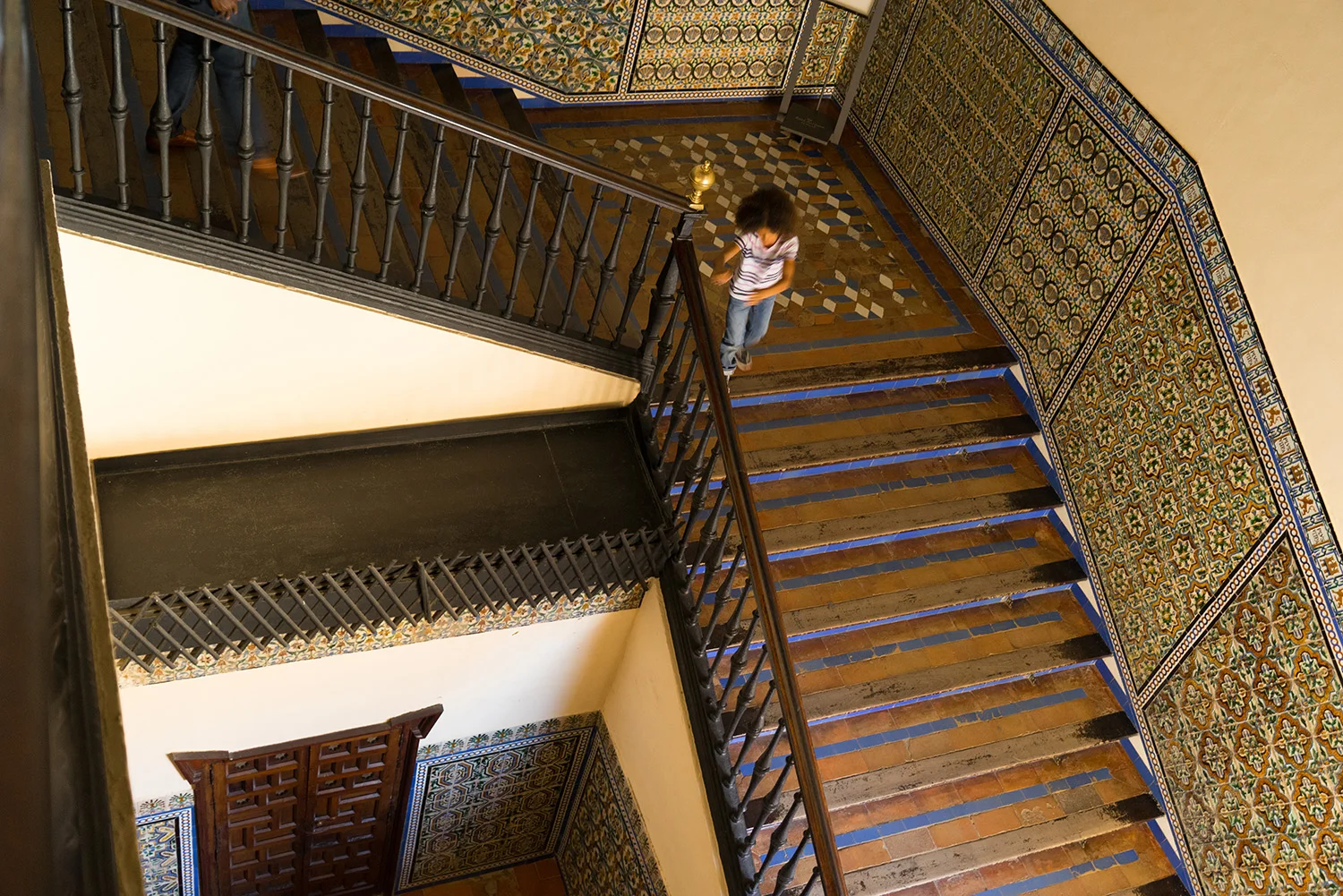 girl running down staircase-lifestyle photos