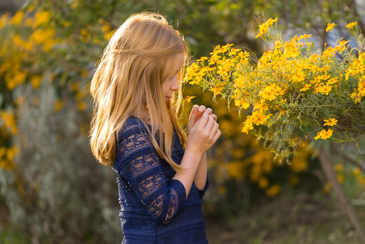 10 year old girl with yellow flowers-Danville family photographer