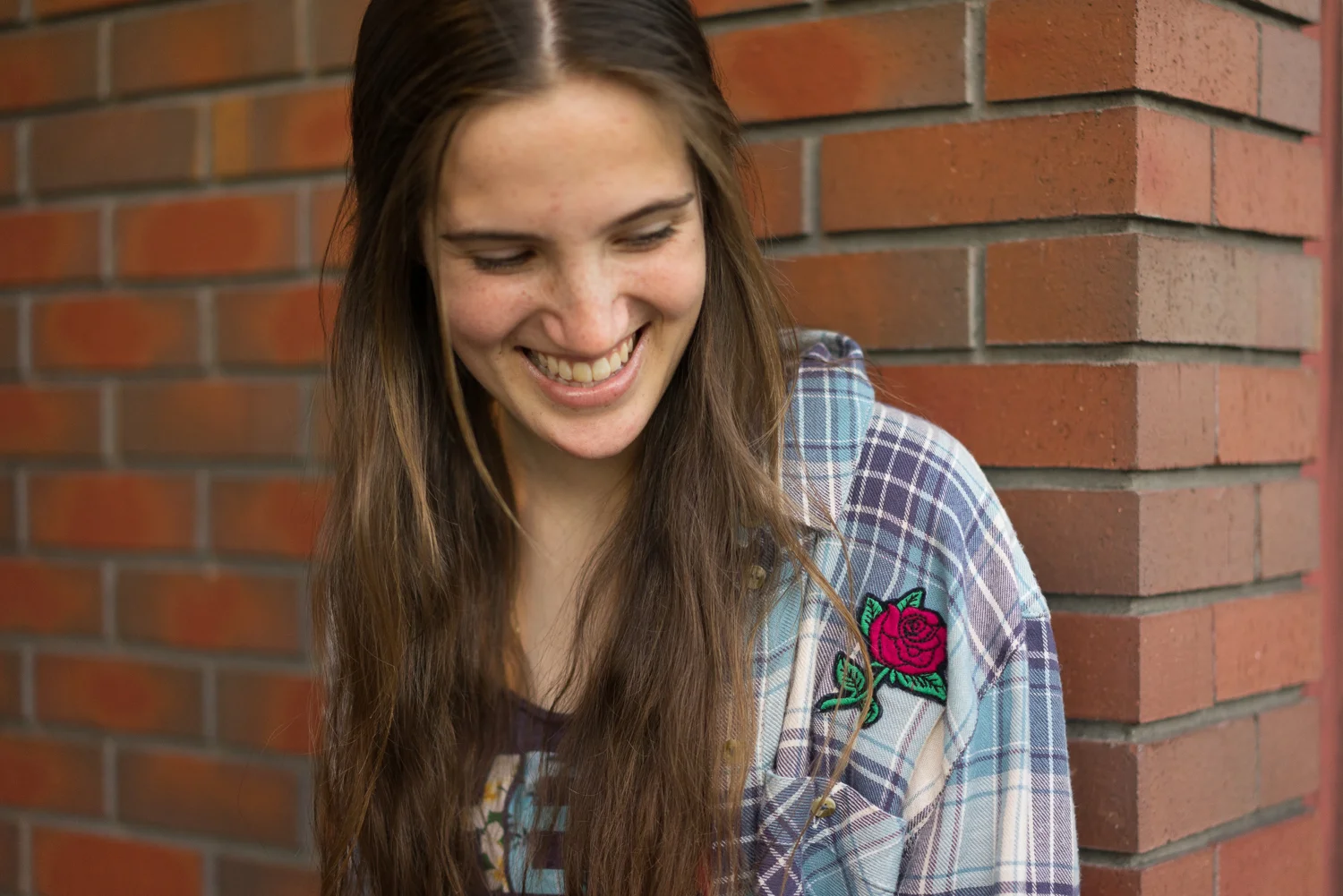 High school graduate looking down-SF East Bay lifestyle photography