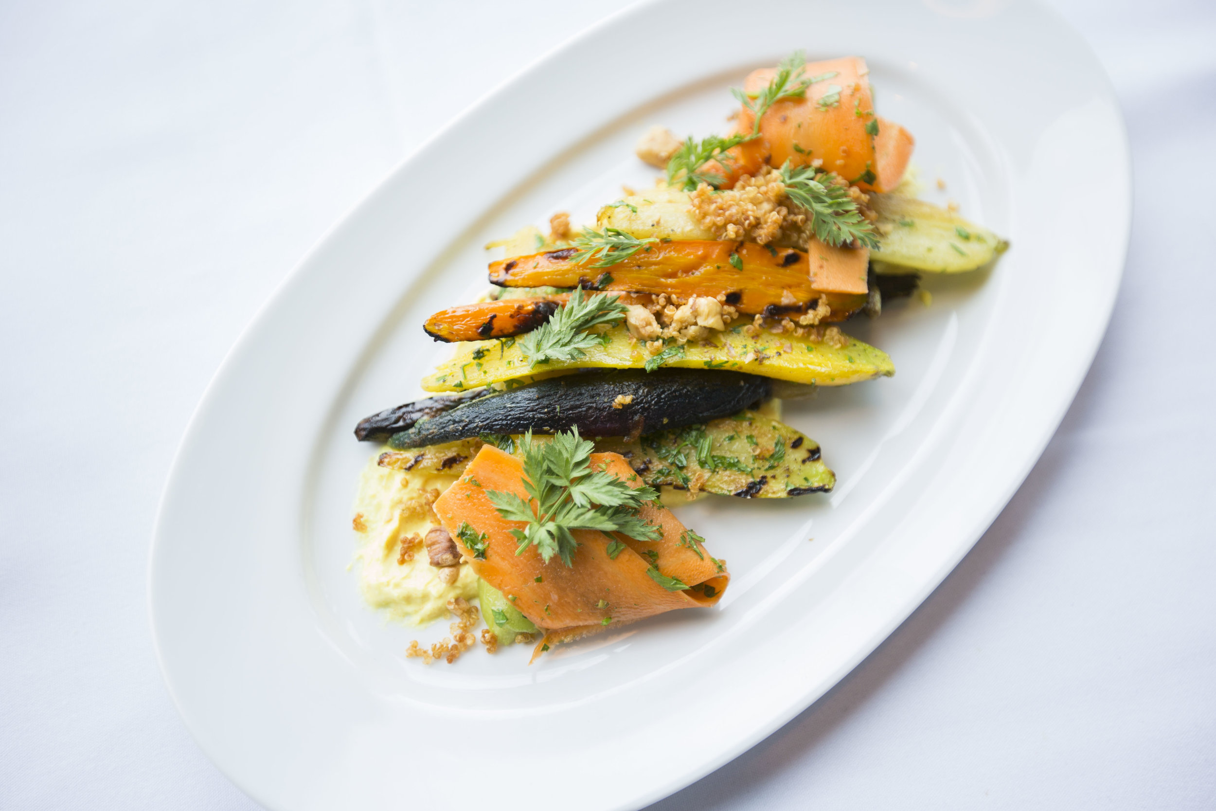  Roasted Heirloom Carrots with crispy quinoa, walnuts and carrot top salsa verde at Augie's Tavern on August 25, 2016 in Madison, WI.&nbsp; 