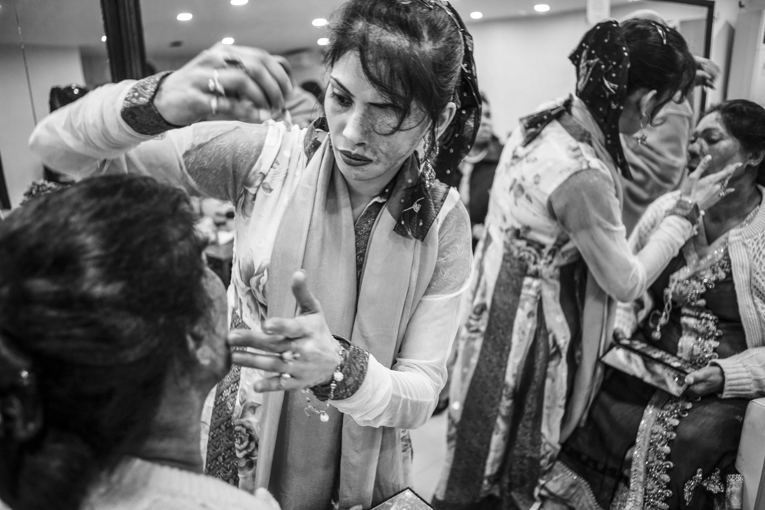  Acid attack survivors Bushra Shafi (Left) gets a makeover by Naureen Jabbar (Right) for the wedding of Sarwari Bibi at Depilex Salon, Jan. 7, 2016 in Lahore, Pakistan. 