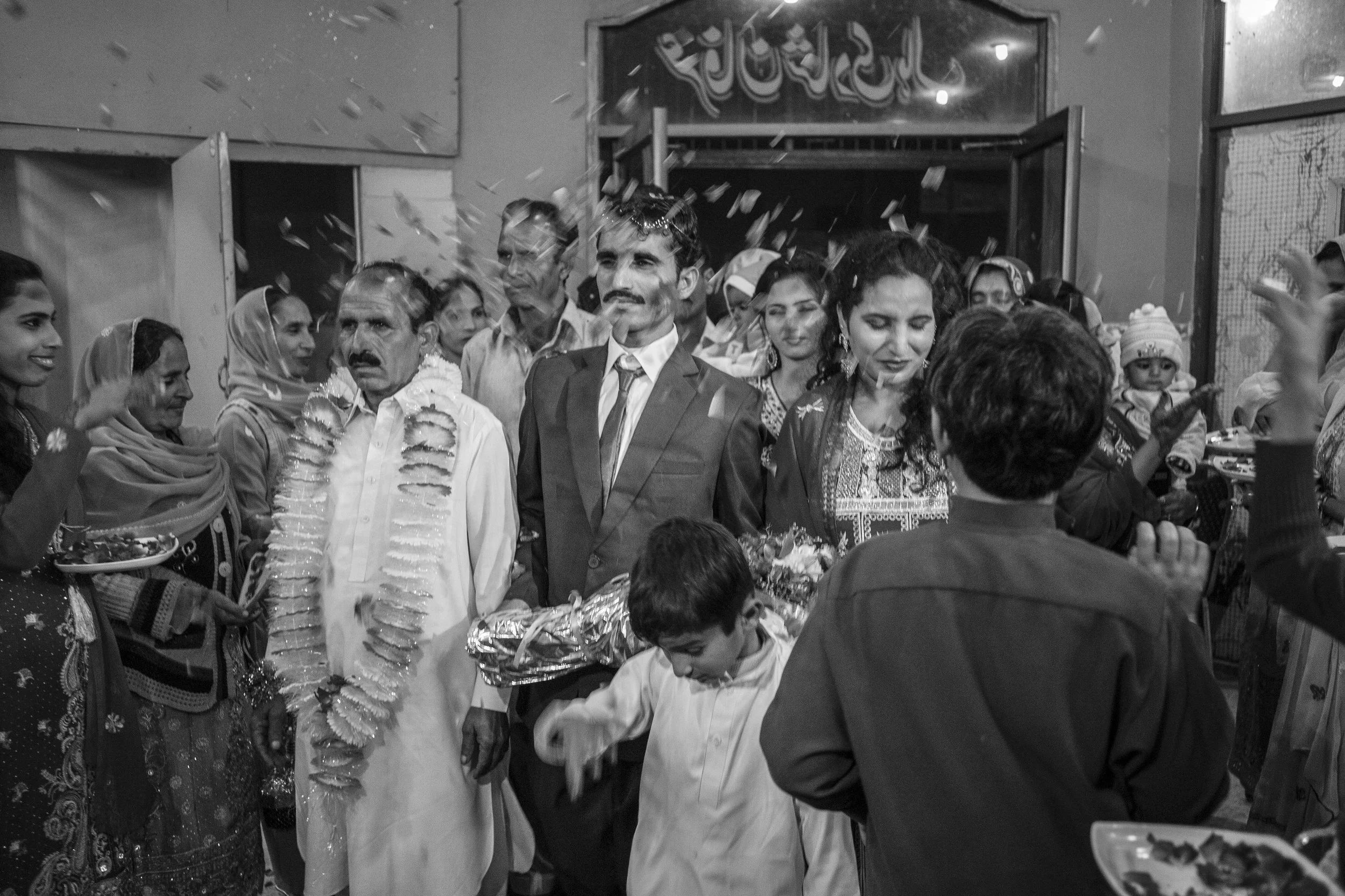  Arshad Ali (Left) arrives at his wedding ceremony along with his family to marry Sarwari Bibi, an acid attack survivor, on Jan. 7, 2016 in Lahore, Pakistan.&nbsp; 
