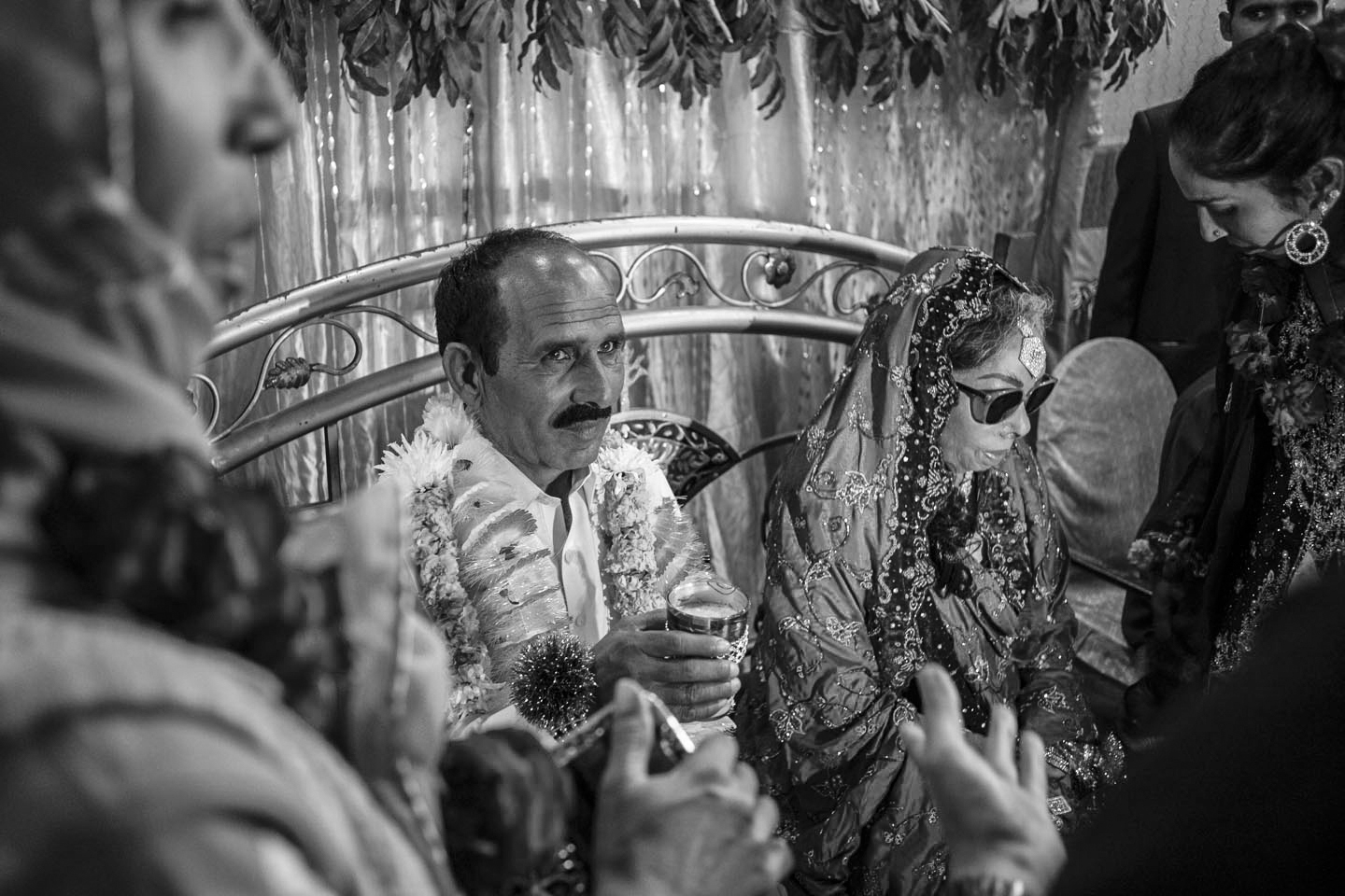  Arshad Ali (Left) sips milk as part of a wedding tradition at the ceremony on Jan. 7, 2016 in Lahore, Pakistan.&nbsp; 